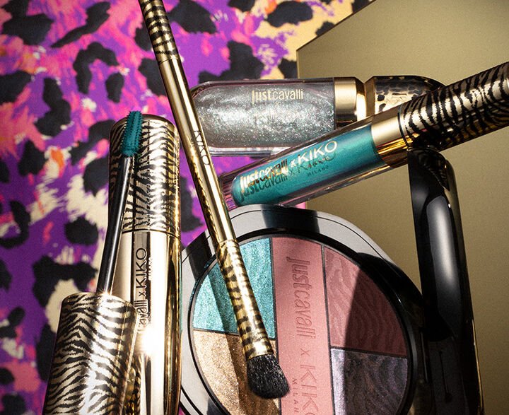 Campanha Just Cavalli x KIKO Milano: paleta, máscara e gloss sobre fundo de estampa de leopardo